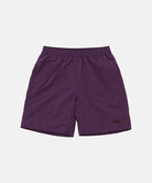 Purple shorts on a light purple background