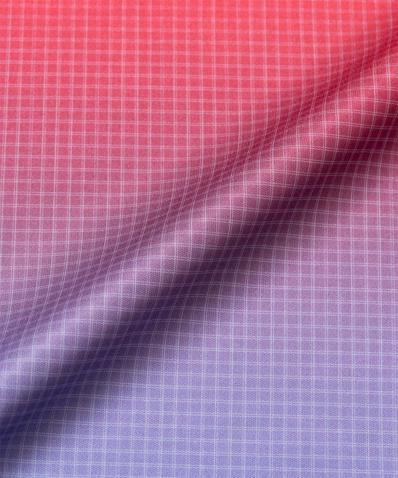 Close-up of red and blue gradient UPF Shield S/S Top fabric.