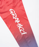 Red and blue gradient UPF Shield S/S Top sleeve with 'Gramicci' branding