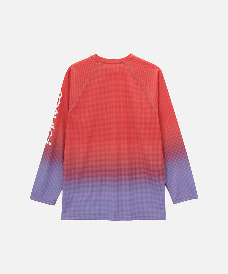 Back view of a Gramicci red gradient UPF Shield S/S Top with a sleeve graphic against a light-tone background.
