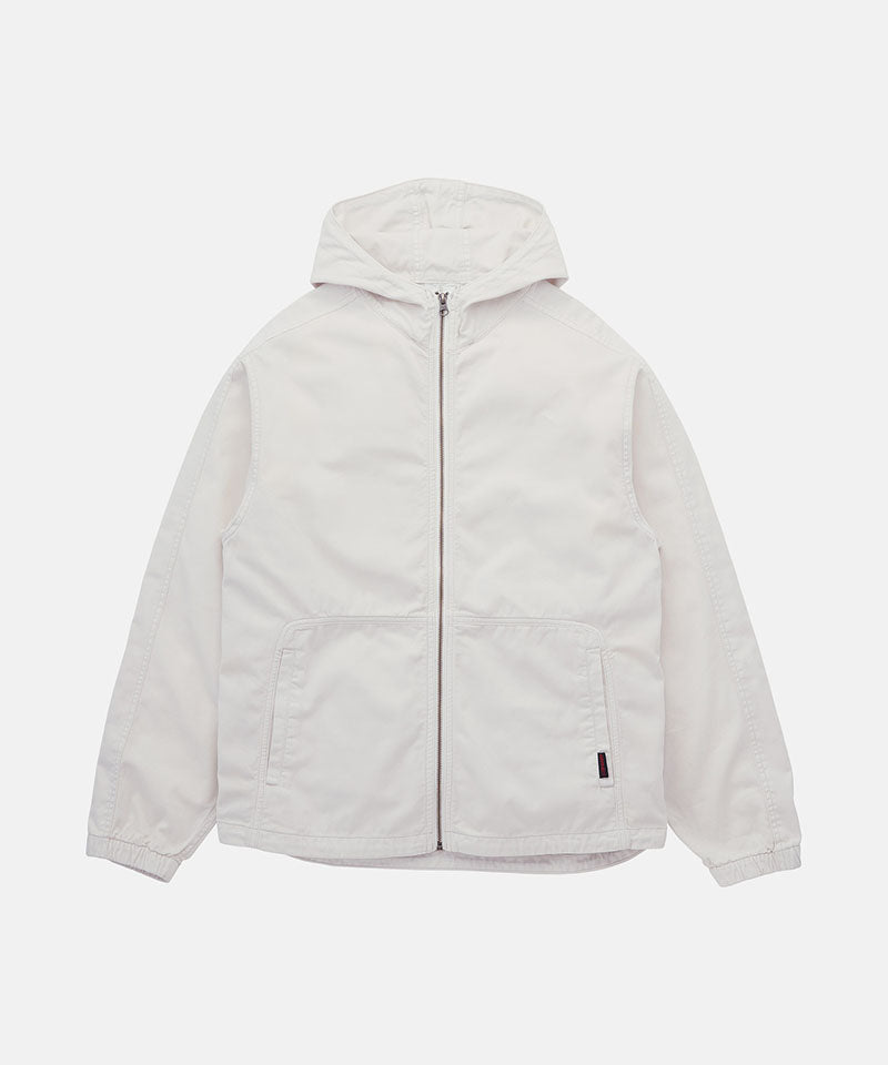 Front view of the Gramicci Beach Hoodie Jacket in stone with a full-length zipper, divided kangaroo pocket, and small logo tab on a light tone background.