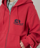 Red hoodie with a brand logo on the chest against a neutral background