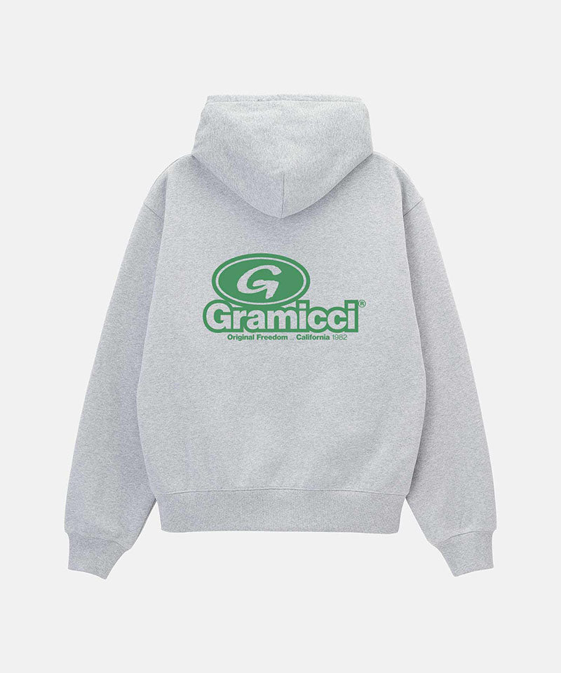 Back view of a Gramicci heather grey '82 Zip Hooded Sweatshirt against a light tone background.
