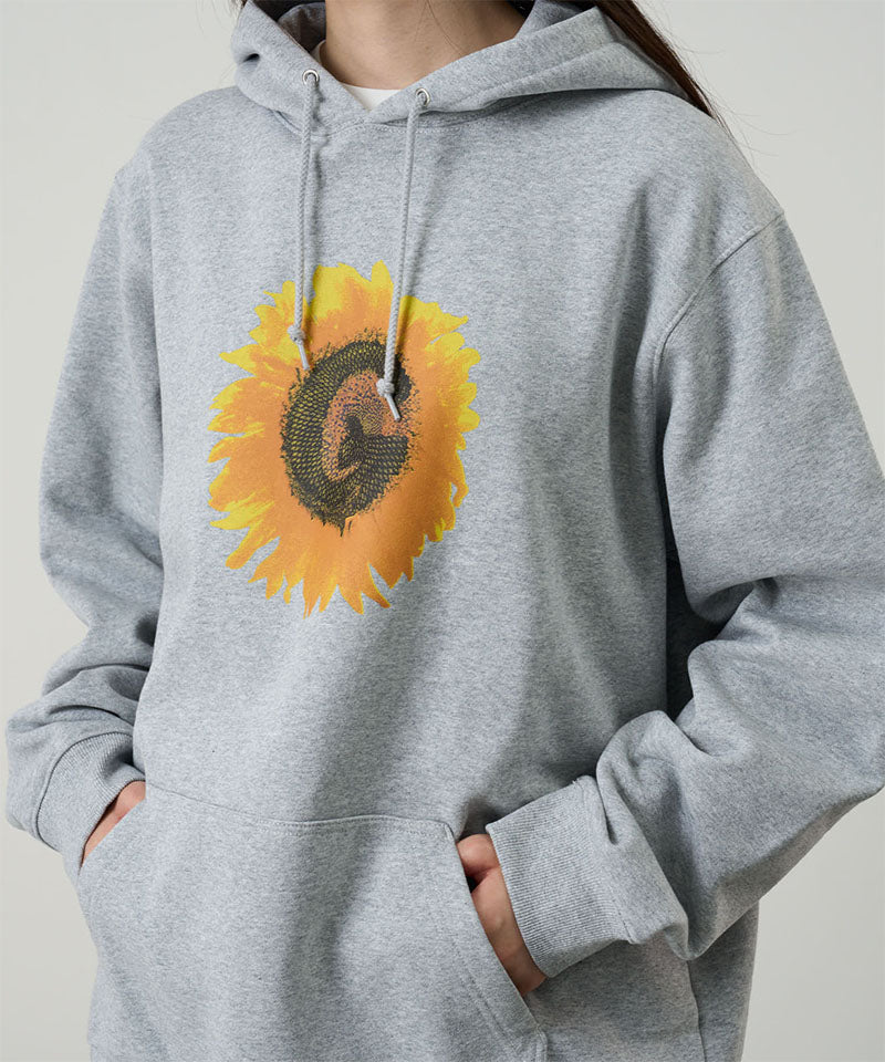 Gray hoodie with a sunflower design on a plain background