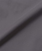 Gramicci dark gray fabric texture with a subtle pattern