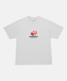 Gramicci white Pomegranate Tee with a graphic against a light-tone background.
