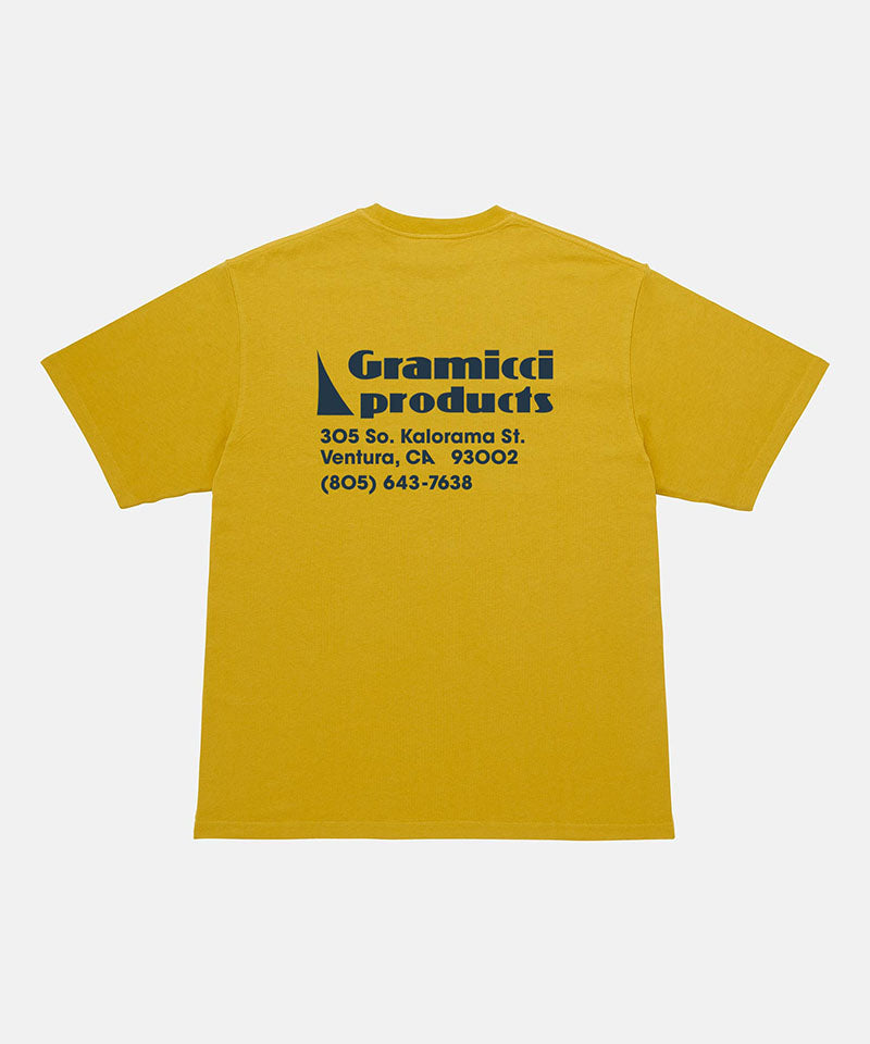 Back view of a Gramicci yellow G-Sail Tee with black graphic against a light-tone background.