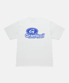 Back view of a Gramicci white '82 Tee with blue graphic against a light tone background.