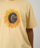Gramicci mango G-Flower Tee with sunflower graphic against a light tone background.