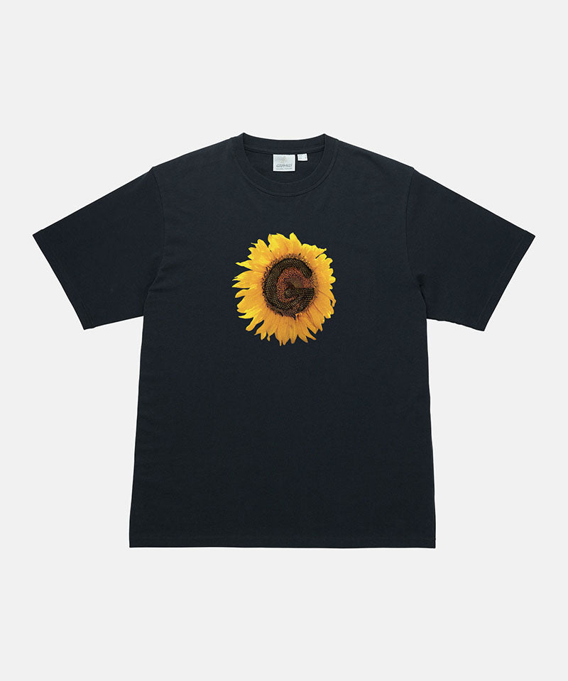 Gramicci vintage black G-Flower Tee with sunflower graphic against a light tone background.