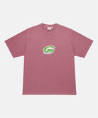 Gramicci red G-Scribble Tee Pigment Dyed shirt with green graphic against a light tone background.

