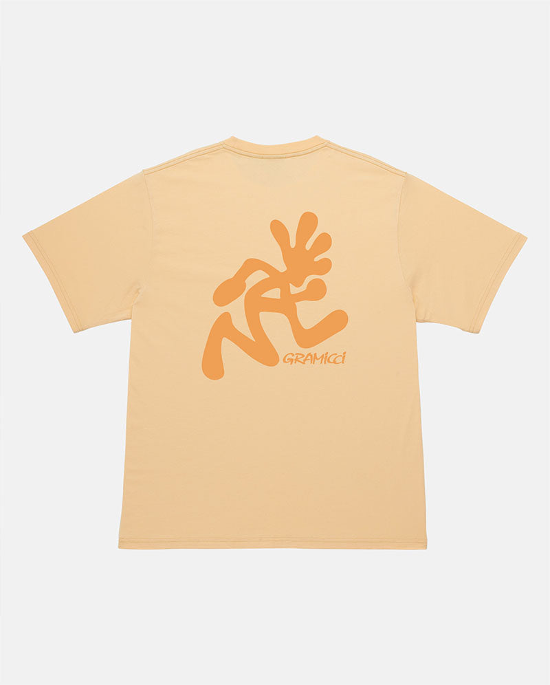 Beige t-shirt with orange graphic design on a light gray background
