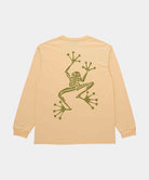 Back view of a Gramicci mango colored Sticky Hands L/S Tee with green frog graphic against a light tone background.