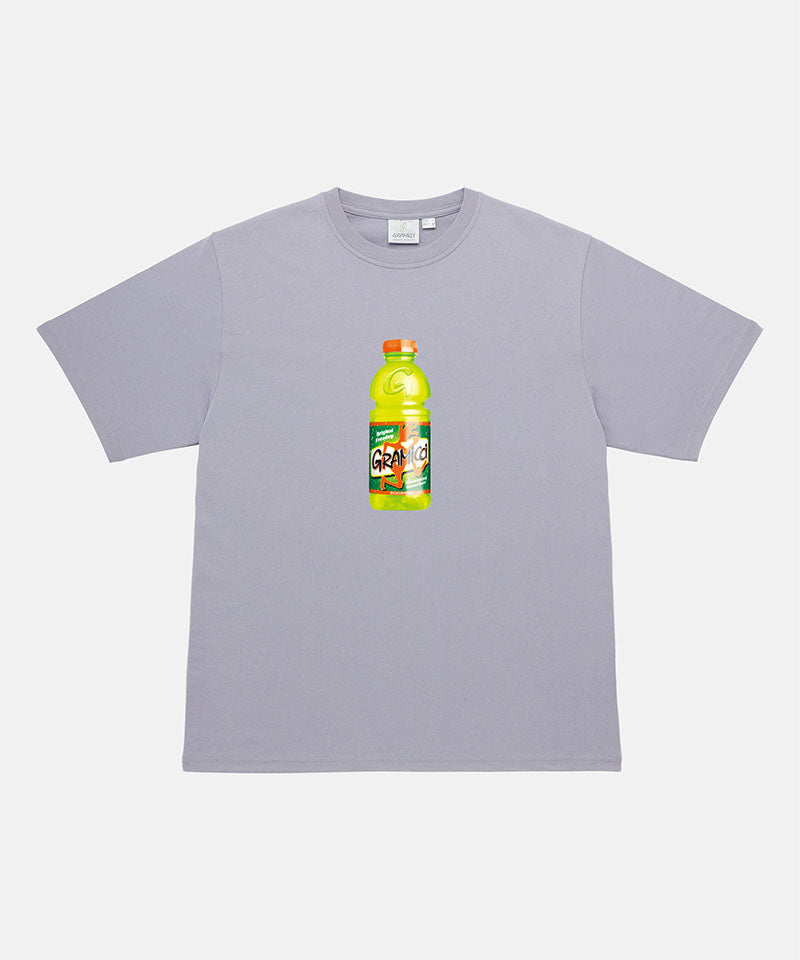 Gramicci lavender colored Quencher Tee with a hydration beverage graphic against a light-tone background.