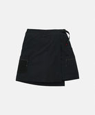Gramicci Guide Skort in black with a black belt against a light-tone background.