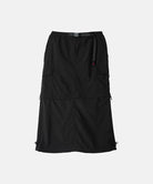 Gramicci Convertible Cargo Skirt in the color black on a light-tone background.