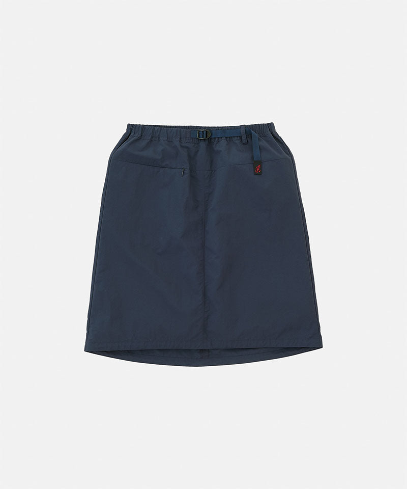 Navy blue skirt with a red tag on a light gray background