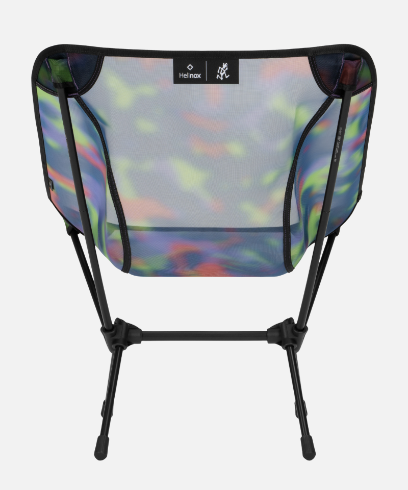 Bright camo Gramici &Helinox Chair One against a light-tone background.